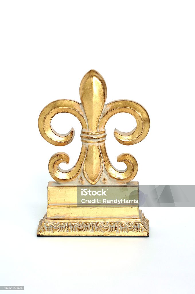 Gold Fleur de Lis Gold Fleur de Lis as a home decoration Bookend Stock Photo