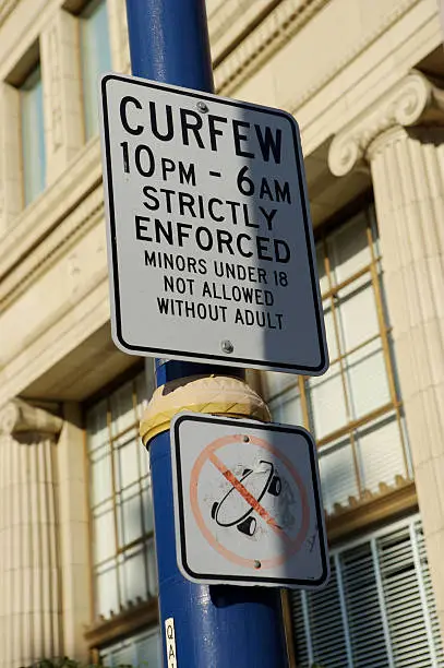 Curfew sign in city center