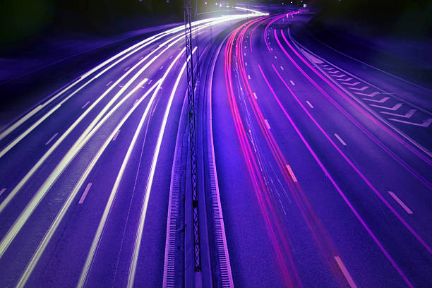 istock cars at night with motion blur. 140236173