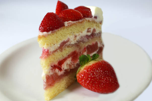 istock Homemade strawberry cake cut. 1402362411