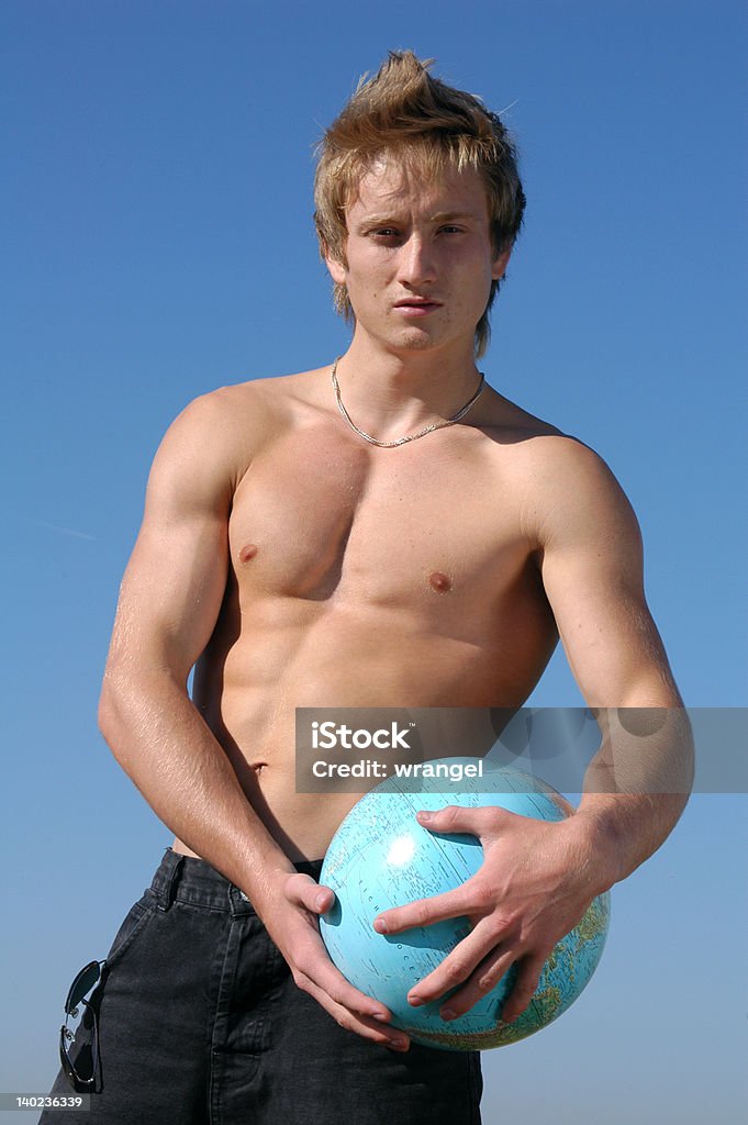 Jovem Muscular homem com um globo - Royalty-free Adulto Foto de stock