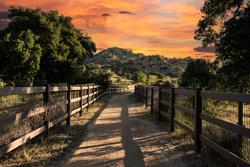 Sunrise view of equestrian trail leading to Chatsworth Park South in the San Fernando Valley area of Los Angeles, California.