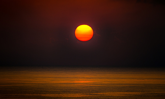 Red sunrise over the ocean