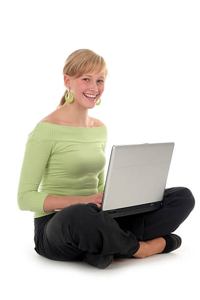 istock Girl sitting on floor using laptop 140236751