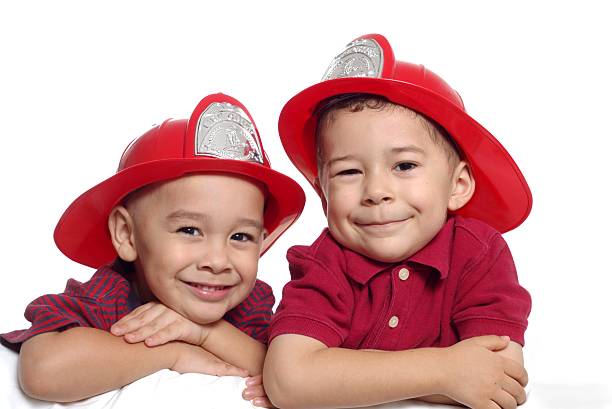 istock Boys wearing fireman hats 4 and 5 years old 140237204