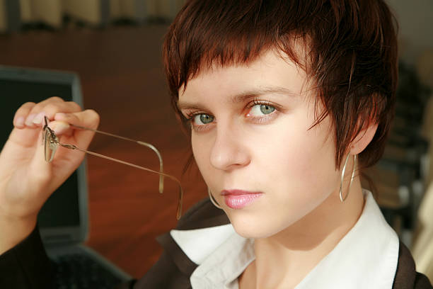 businesswoman with glasses stock photo