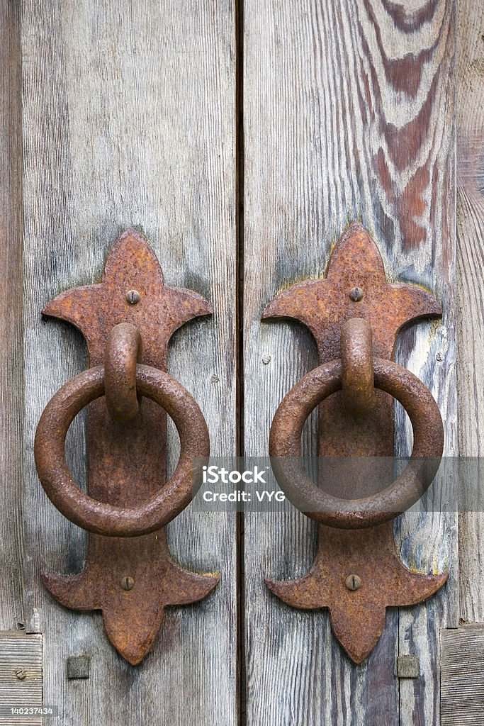 Vintage weathered door with rusty handles Abstract Stock Photo