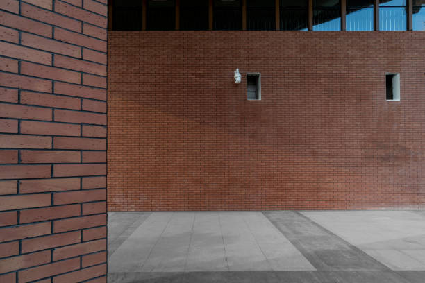 istock road outside city brick wall building 1402385319