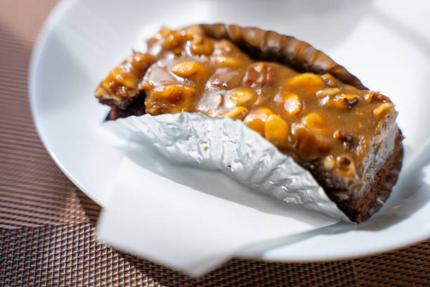 istock fudgey salted caramel and macadamia brownies 1402386941