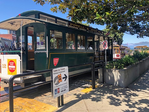San Francisco, California, United States - May 4th, 2022: A closeup photo of a San Francisco cable car near Fisherman's Wharf, in downtown San Francisco, California, United States