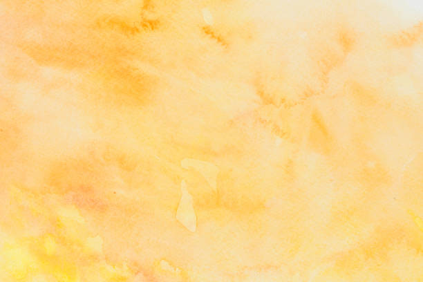 istock yellow painted watercolor background texture 1402394950
