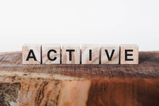 Active Word Written In Wooden Cube stock photo