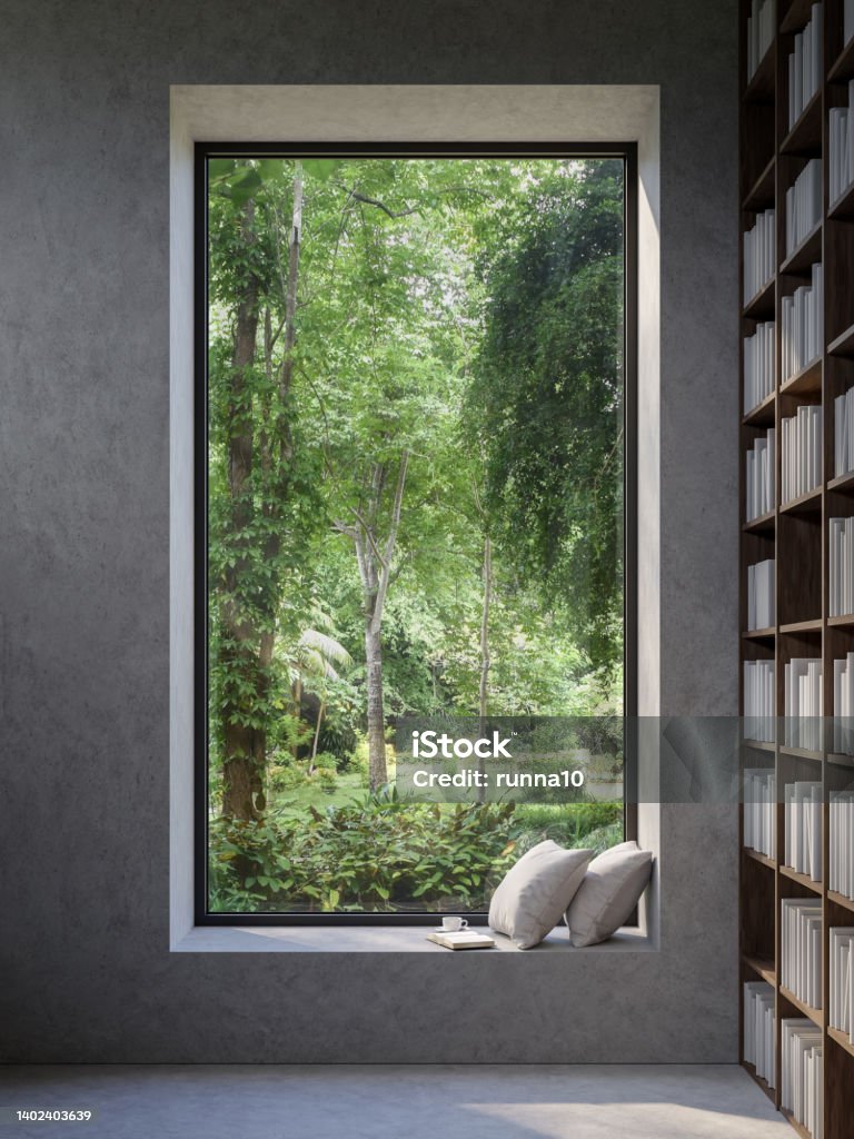 Reading corner by the window with nature view 3d render Reading corner by the window with nature view 3d render there are concrete wall decorated with wooden bookshelves Window Stock Photo