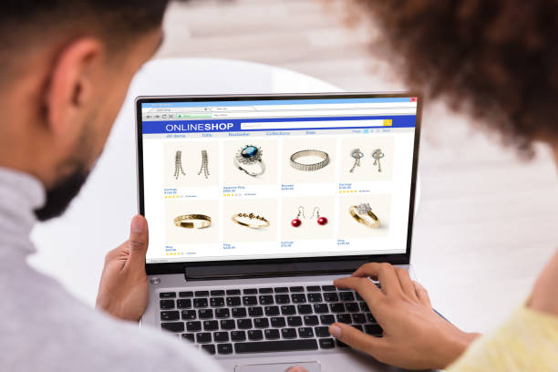 Couple Using Laptop For Shopping Online