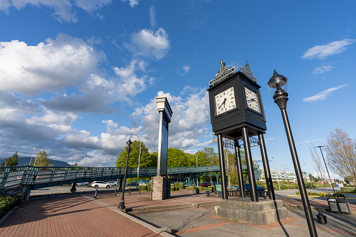 Port Coquitlam, BC, Canada - April 26 2021 : Shaughnessy station mall clock tower.