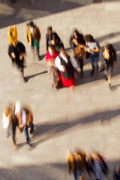 istock People walking , blur motion, view from above . 1402414671