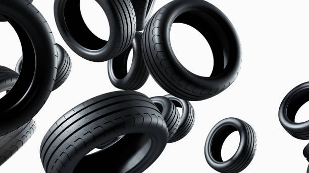 Abstract background with heap of falling tires isolated on white background