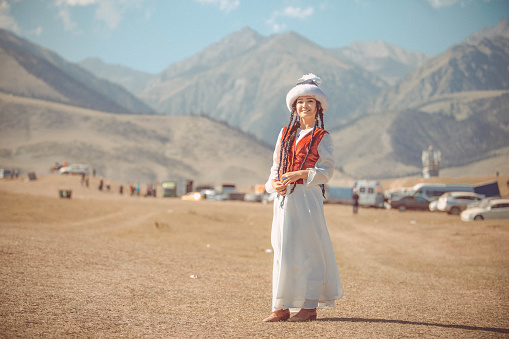 Isyk-Kul, Kyrgyzstan - September ‎29, ‎2018: Kyrgyz woman in national dress during World Nomad Games