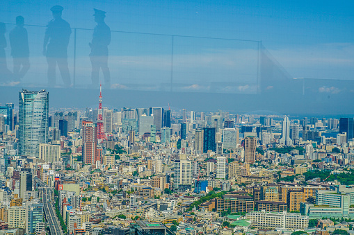 Tokyo townscape and people silhouettes. Shooting Location: Tokyo metropolitan area