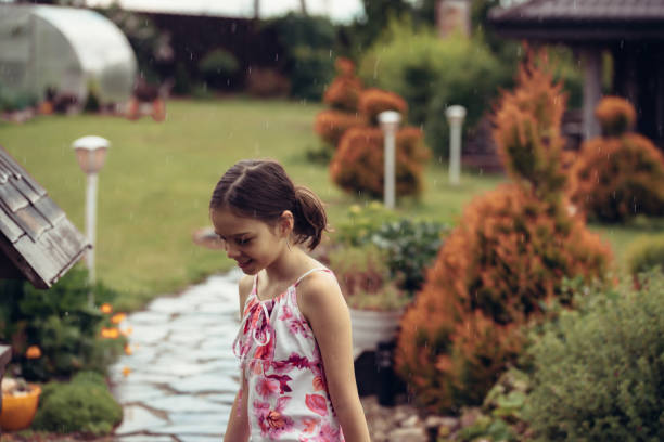 istock A child walks in the summer garden. 1402425524