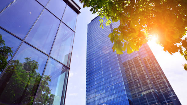 istock Fresh green trees and office building, 1402431543