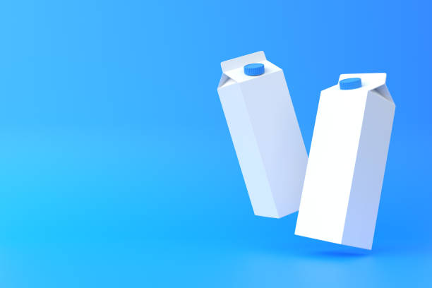 istock Falling milk carton packs on a blue background 1402432574