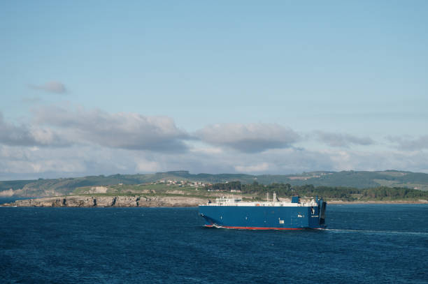 A large Ro-Ro ship by the coastside. Cantabria, Spain.