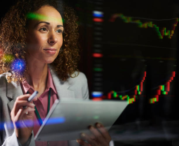 istock businesswoman with infographics 1402436770
