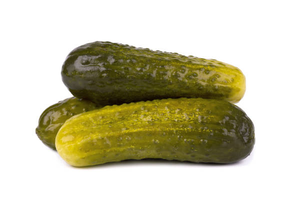 istock Marinated pickled cucumber isolated on white background. Pickled cucumber with clipping path. Closeup. 1402438867
