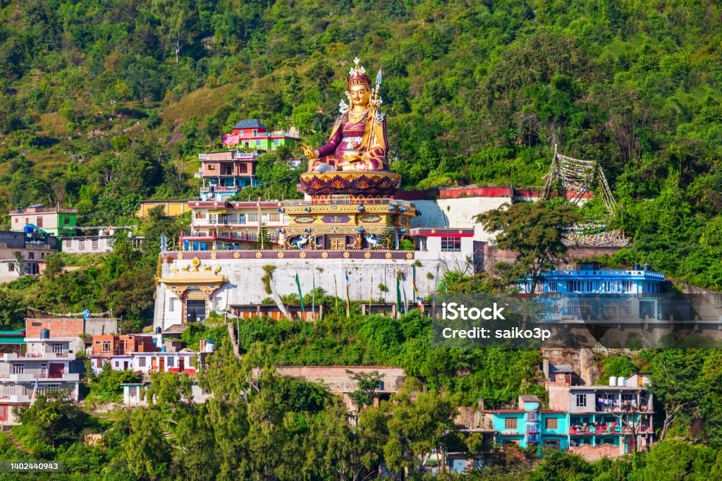 Guru Padmasambhava statue in Rewalsar, India Guru Padmasambhava or Guru Rinpoche statue near the Mahatma Buddha temple in Rewalsar town,  Himachal Pradesh state in India Asia Stock Photo