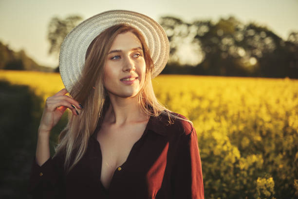 istock woman in a blooming field 1402442265