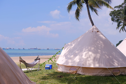 Large family camping tents for rent along East Coast Park in Singapore. Glamping is a popular leisure activity in Singapore, especially for families during the school holidays; staycation fun