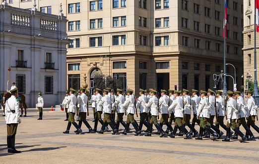 Santiago de Chile, Chile, November 29, 2018: Guard changing ceremony in front of the presidential palace La Moneda. The ceremony is a popular tourist attraction.