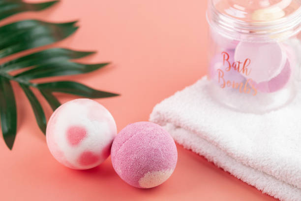 istock aromatherapy and spa, pink bath salt bomb on pink background 1402452425