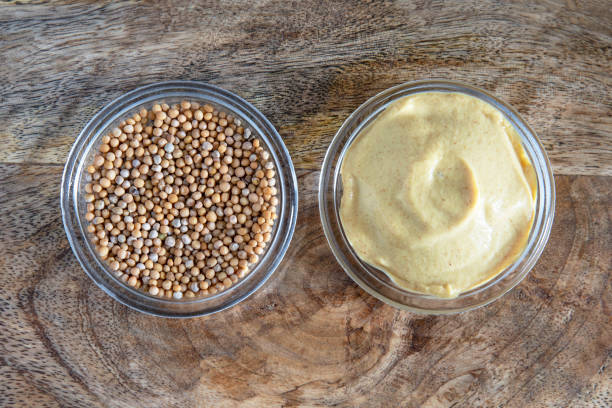 istock Close-up of mustard seeds and mustard 1402453331