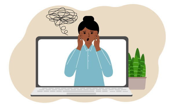 istock Online consultation with a psychologist. Laptop with a woman with confused thoughts. Psychotherapeutic practice, psychiatric consultation. 1402454103
