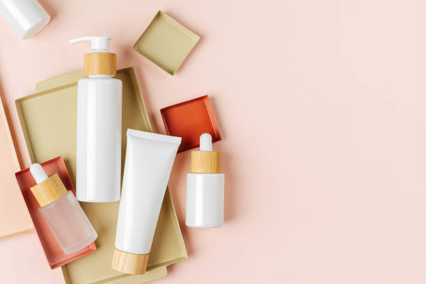 istock Various blank cosmetic container mock-ups on pastel color backgroun. Background for branding and packaging presentation. Natural skincare beauty product concep 1402455497