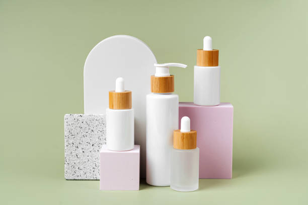 istock Various blank cosmetic container mockup  on square podiums pastel color background.  Background for branding and packaging presentation. Natural skincare beauty product concept. 1402455866