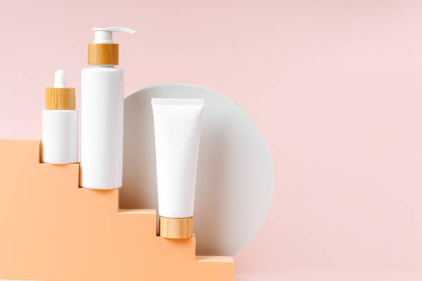 istock Various blank cosmetic container  on beige stairs with  geometric shapes. Background for branding and packaging presentation. Natural skincare beauty product concept. 1402455891