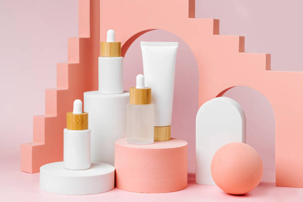 istock Various blank cosmetic container mock-ups on podiums and geometrical forms. Background for branding and packaging presentation. Natural skincare beauty product concep 1402455900