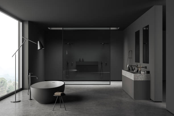 istock Grey bathroom interior with sink, shower and bathtub near panoramic window 1402456547