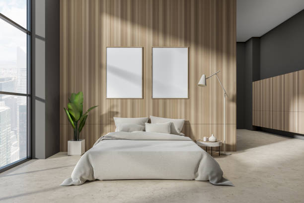 istock Front view on dark bedroom interior with two white poster 1402456562