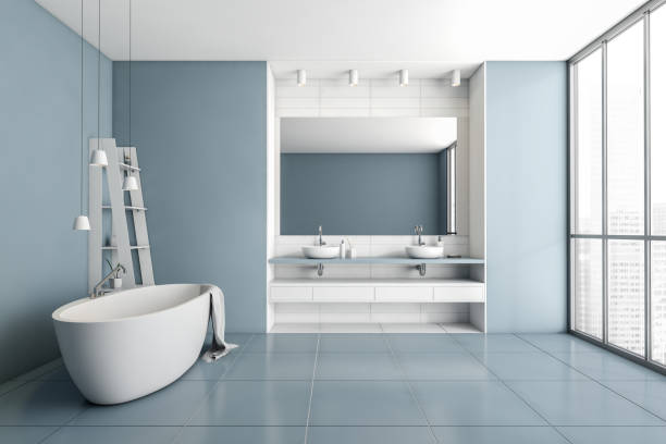 istock Front view on bright bathroom interior with large mirror, bathtub 1402456789