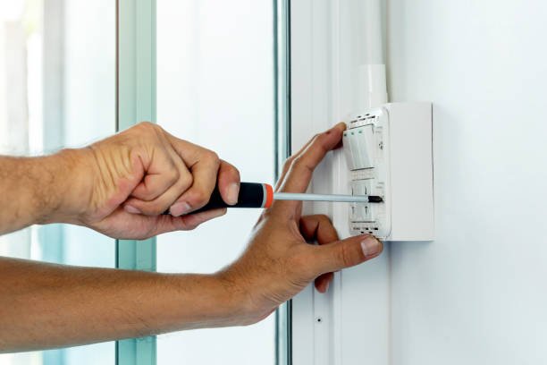 istock Install the electric power socket and switch in to a plastic outlet box on the wall. 1402458629