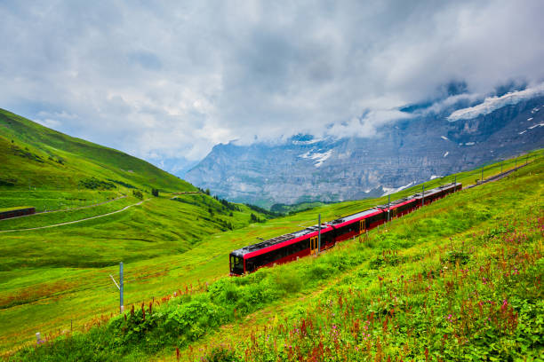 train in lauterbrunnen valley, switzerland - swiss culture european alps mountain eiger imagens e fotografias de stock