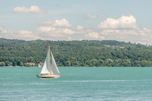 Sailing boats on Lake Constance in Germany in spring. Mainau island, Germany.