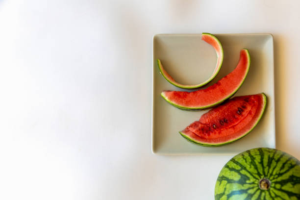 istock Juicy watermelon with sliced isolated on white background. Clipping path. 1402462280