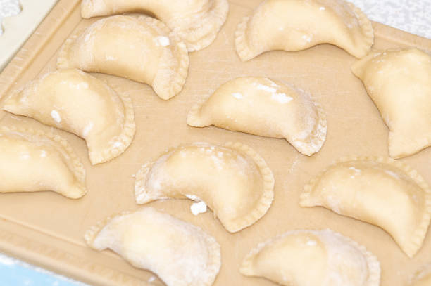 istock dumplings with cottage cheese on the kitchen board 1402464788
