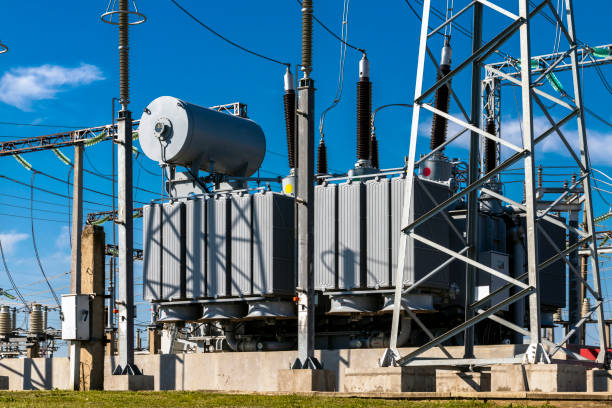 istock High voltage power transformer substation against the blue sky. 1402468102