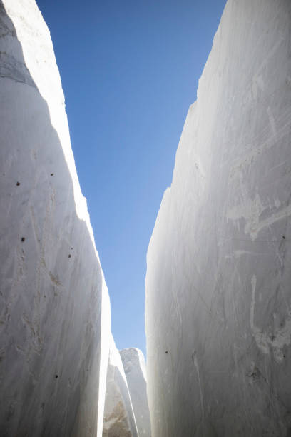 istock Deposit of blocks of statuary white marble 1402470102